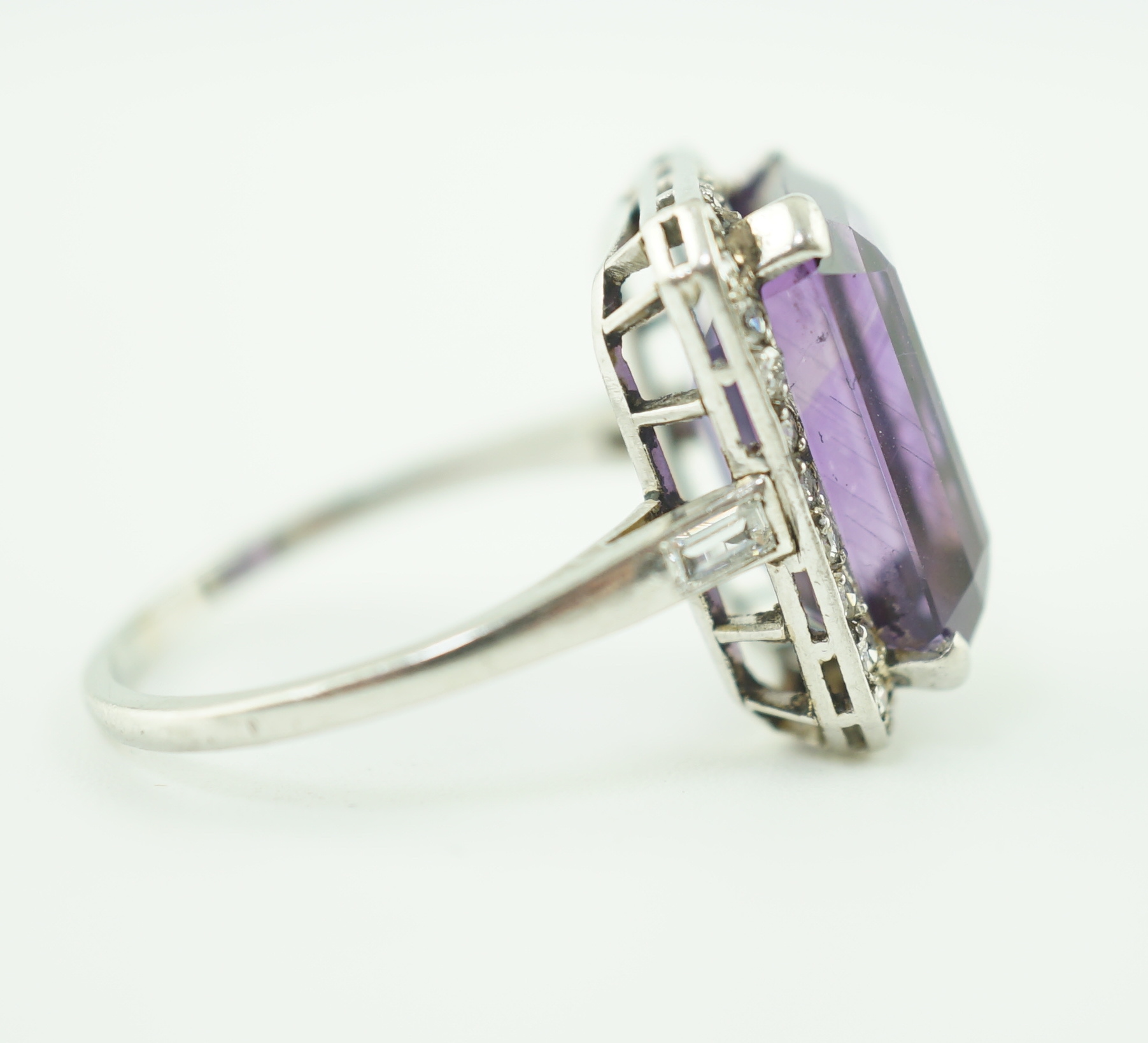 A mid 20th century platinum?, amethyst and diamond set cluster ring